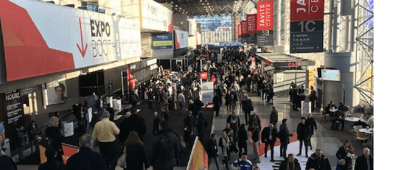 Retail professionals scurry through the Javits convention center at the NRF Big Show.