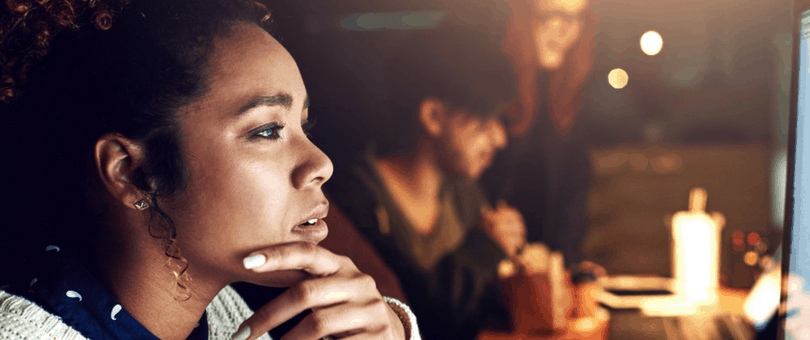 Woman ponders an online order: Is it legitimate or fraudulent? Guaranteed fraud protection can help the machine learn.