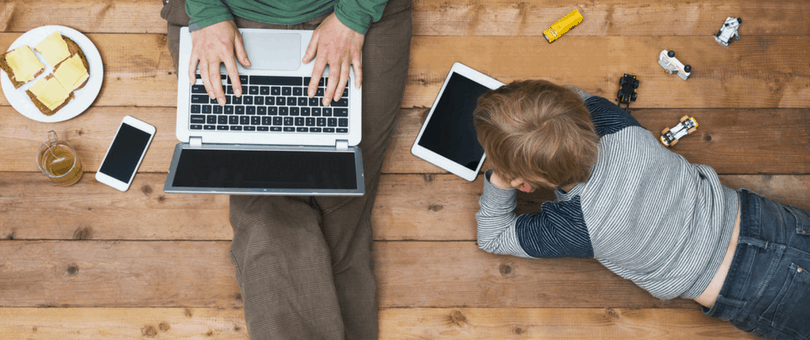 Mother and son with consumer electronics