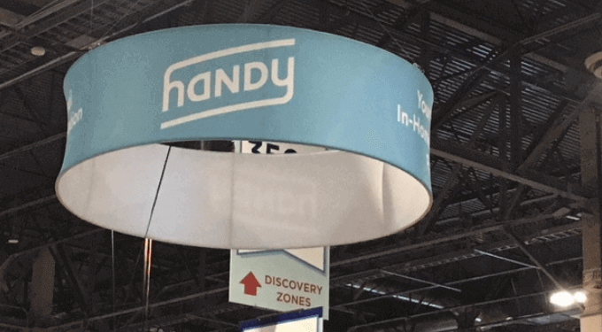 The Handy sign at Handy's booth during Shoptalk 2018