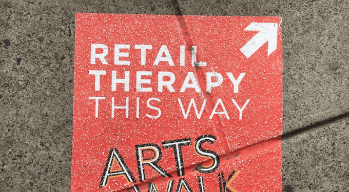 A Retail Therapy sign painted on the sidewalk in Allentown, Pennsylvania