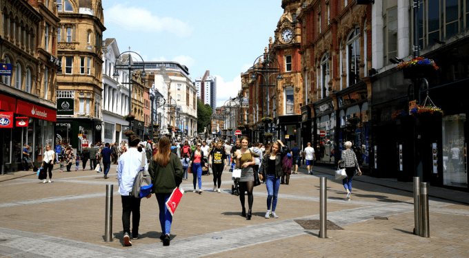 Briggate on a Sunday in Leeds with shoppers and tourists.