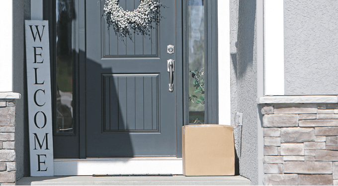 Package at door with shadowy figure