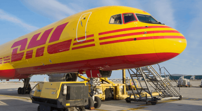 DHL Cargo Plane being loaded for cross-border shipping