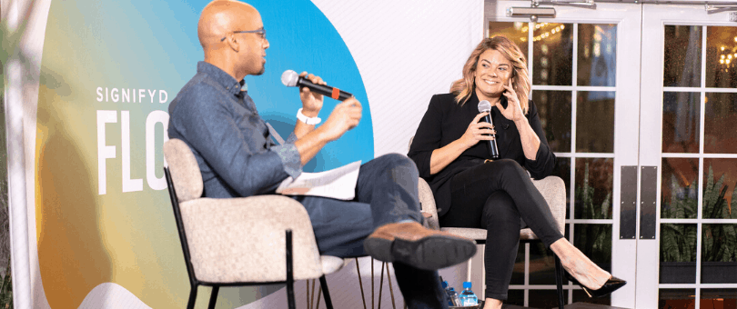 TUMI's Meg Bradford talks with Signifyd's Indy Guha on stage at FLOW New York