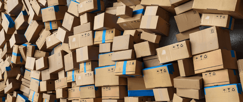 big pile of hundreds of boxes -- ecommerce packages