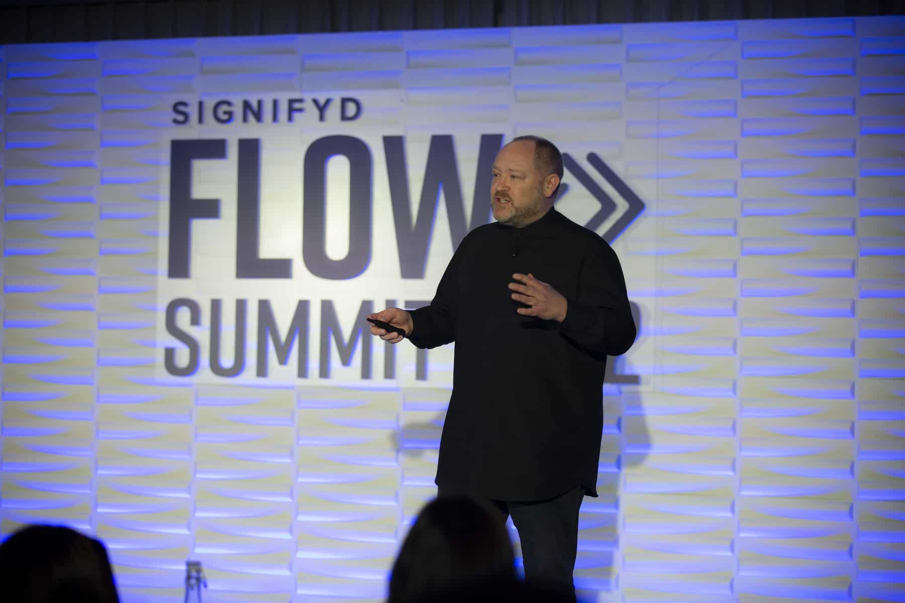 Brendan Witcher, Forrester analyst speaking at Signifyd's FLOW Summit 2022