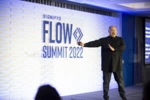 Forrester's Brendan Witcher on stage at the FLOW Summit 2022