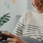 Woman smiling over successful online payment