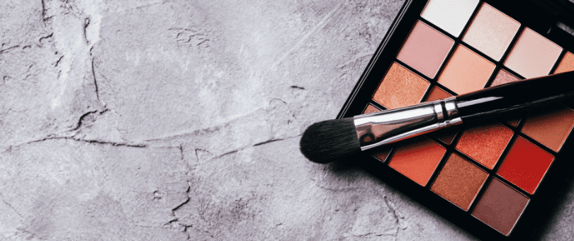 a makeup brush and makeup to illustrate Signifyd Ecommerce Pulse blog post for June
