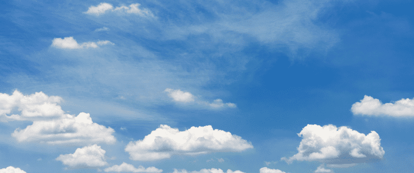 puffy white clouds in a blue sky