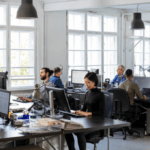 A busy tech startup, desks, employees, etc.