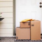 ecommerce packages stacked at the door