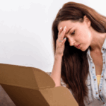 A woman clearly disappointed with an ecommerce order she just opened