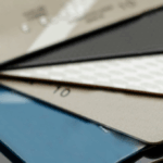 A close up of a stack of seven or eight credit cards to represent the issuing bank vs. acquiring bank blog post