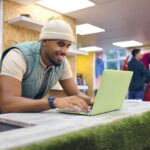 A shop owner pleased with rising payment