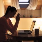 friendly fraudster at a laptop