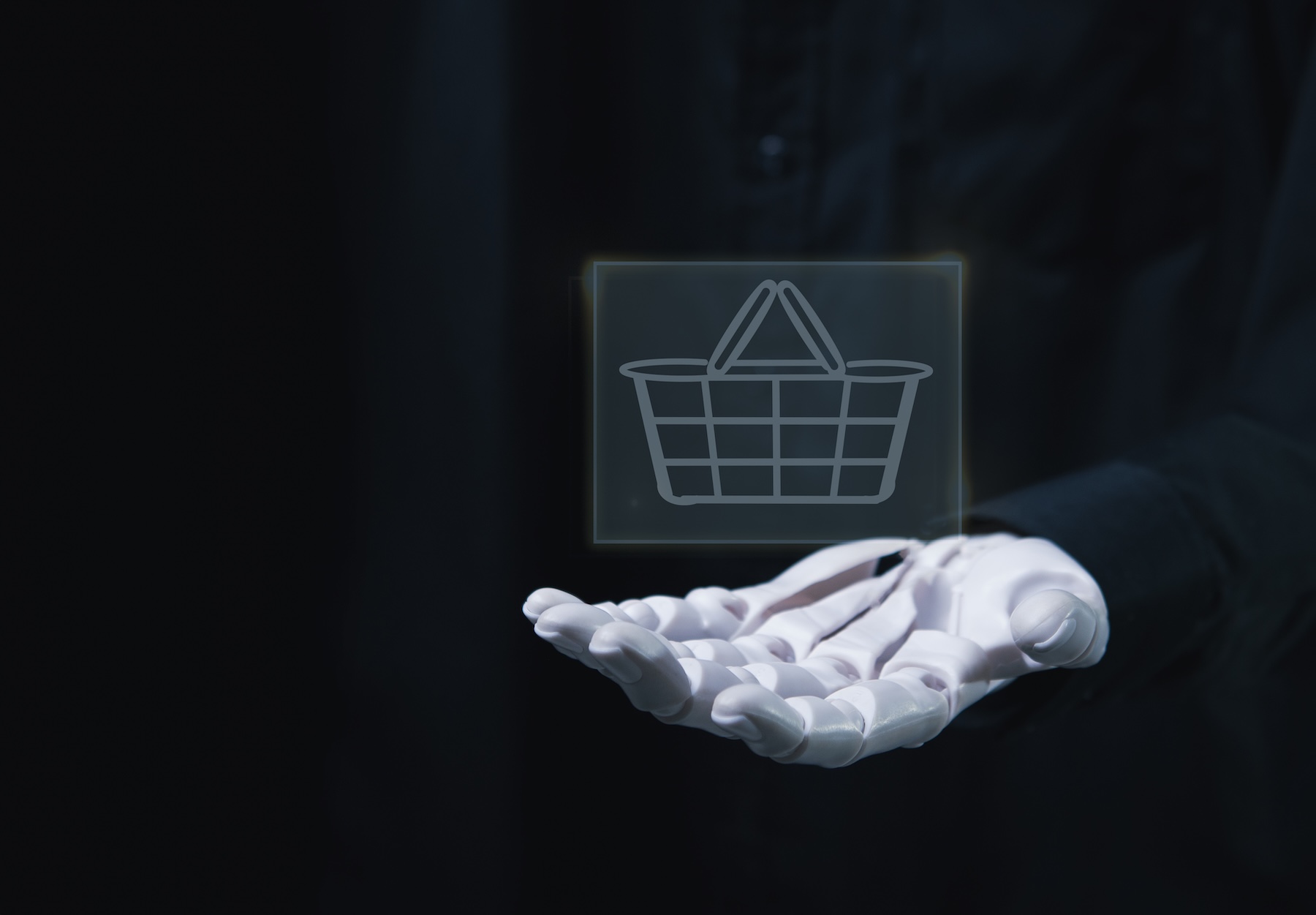 image of a robotic hand holding a shopping basket to symbolize agenti commerce in marketplaces
