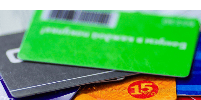 A stack of gift cards piled haphazardly to illustrate gift card fraud blog post