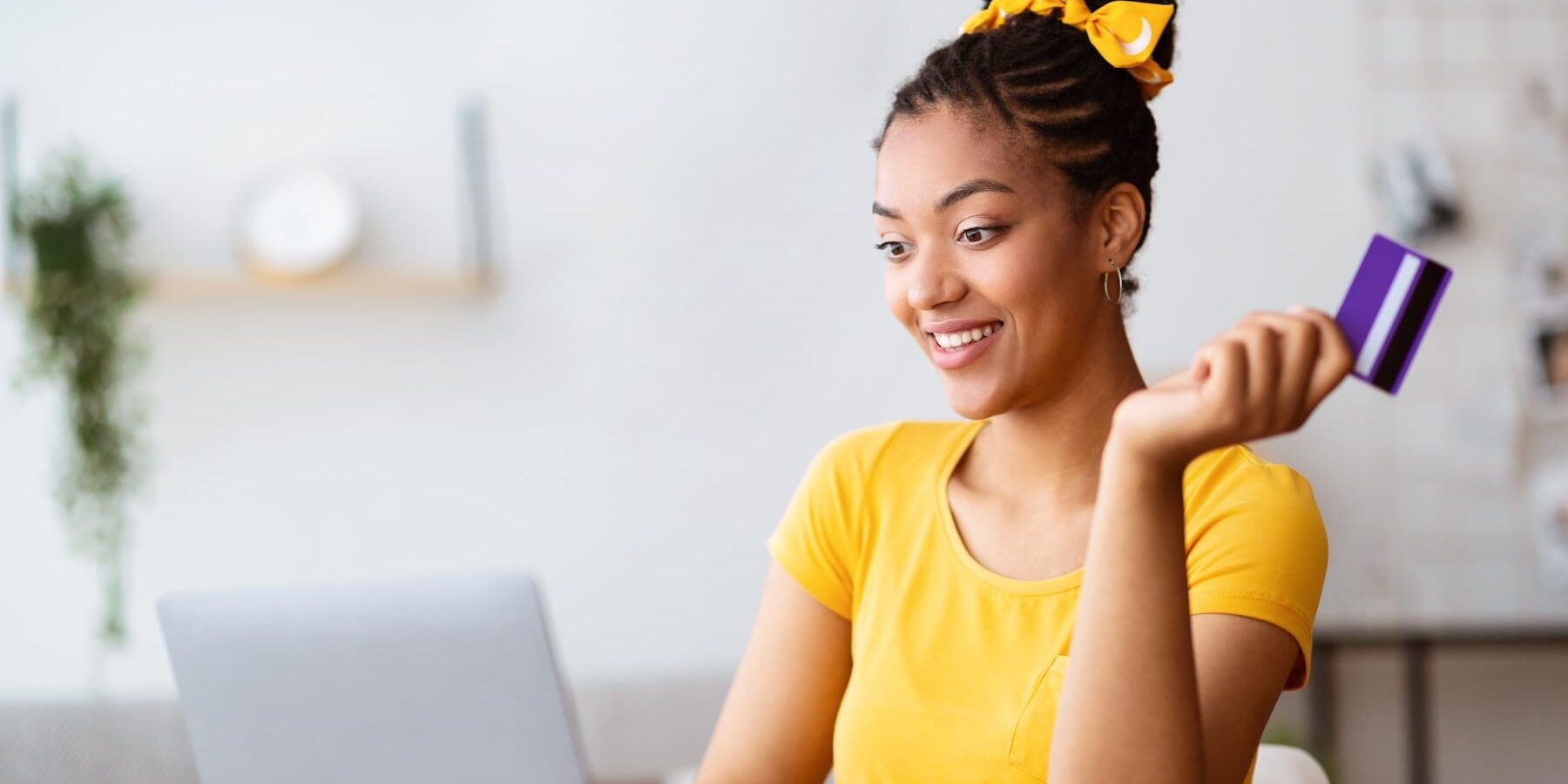 A woman shopping online to illustrate Signifyd's Cyber Five data wrap up