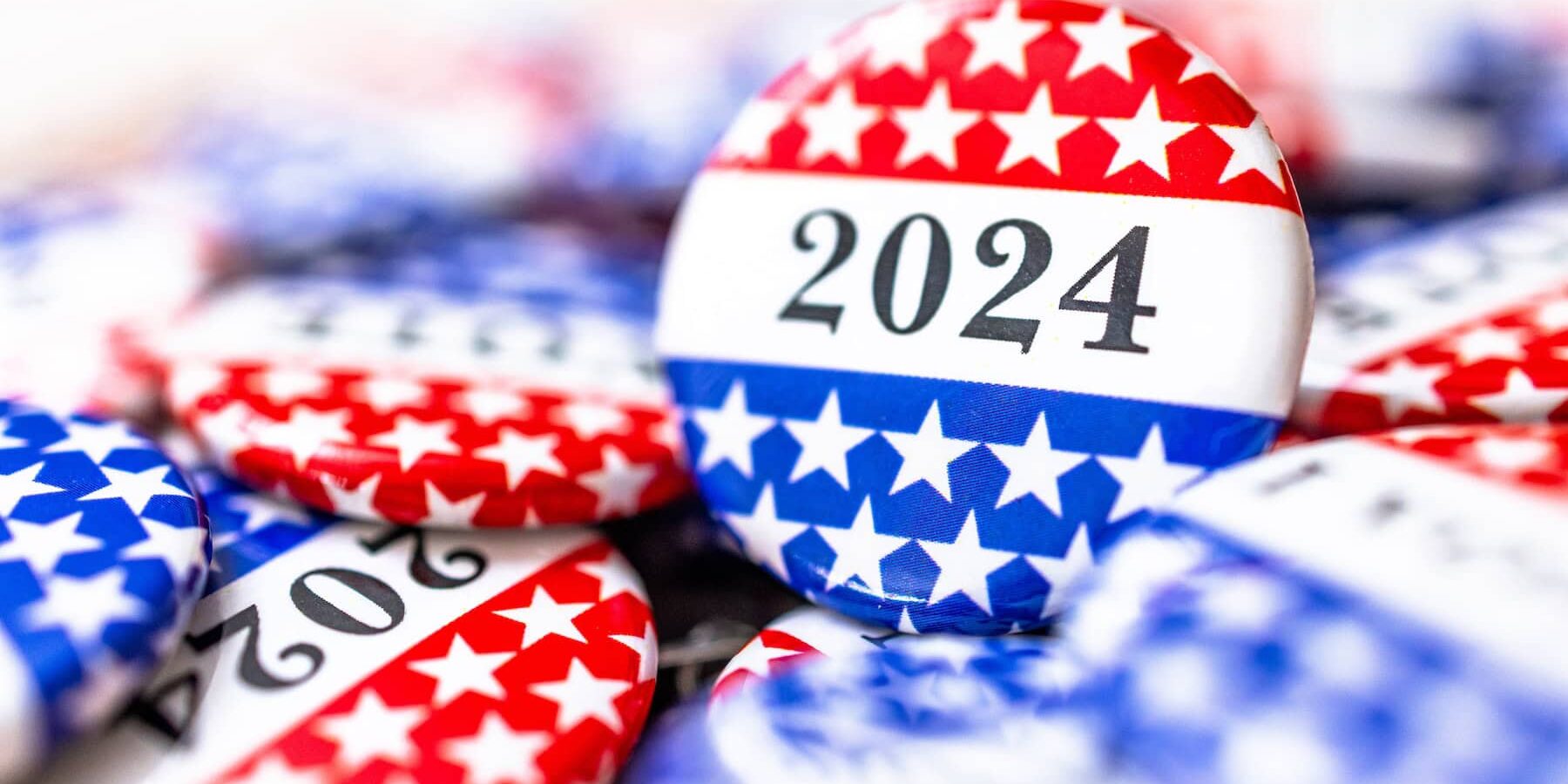 Campaign buttons with red, white and blue, stars and 2024