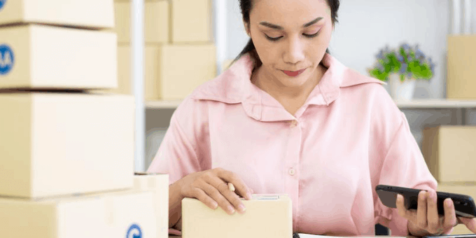 Woman processing ecommerce return