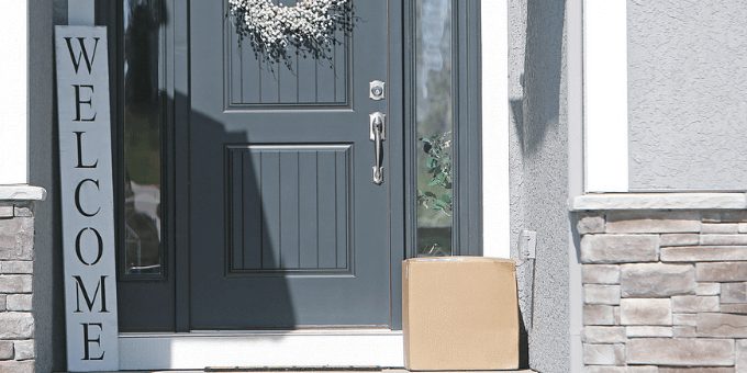 Package at door with shadowy figure