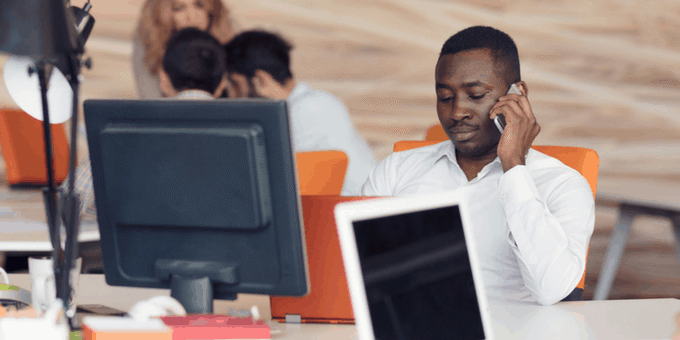 A customer support worker on phone