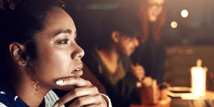 Woman ponders an online order: Is it legitimate or fraudulent? Guaranteed fraud protection can help the machine learn.